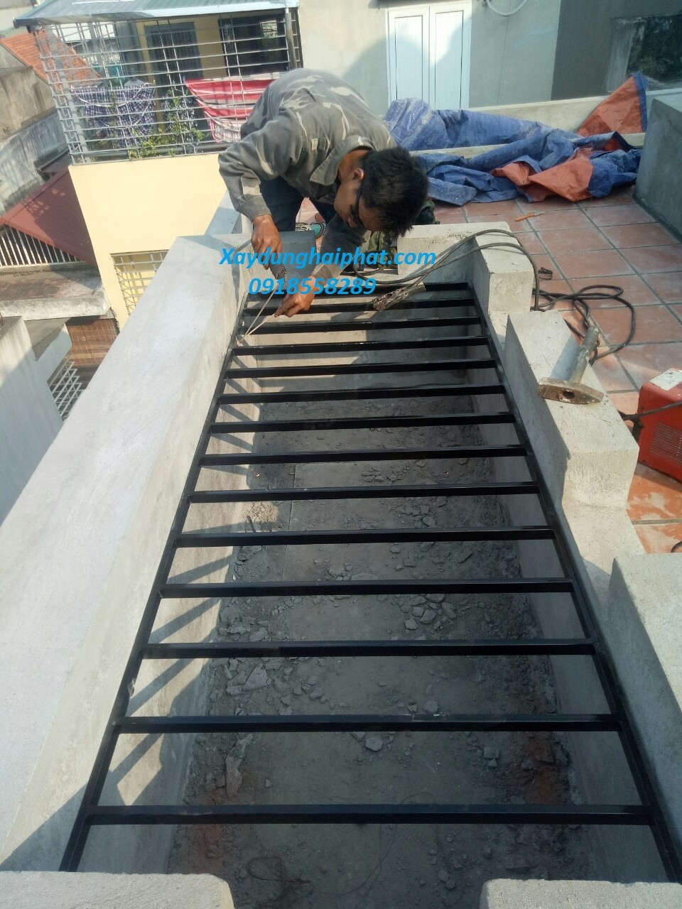lam-chuong-cop-inox-lan-can-ban-cong-hang-rao-sat-hop-dep-o-hn-gia-re-1