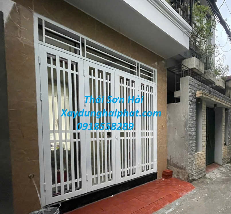 xuong-gia-cong-cua-sat-mai-ton-lam-cua-sat-mai-ton-cho-nha-dan-o-HN-5